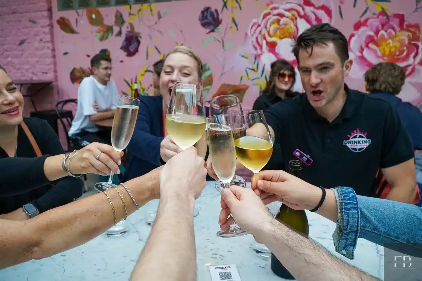 A group of people in a laneway bar on a drinking history walking tour in Melbourne, Australia